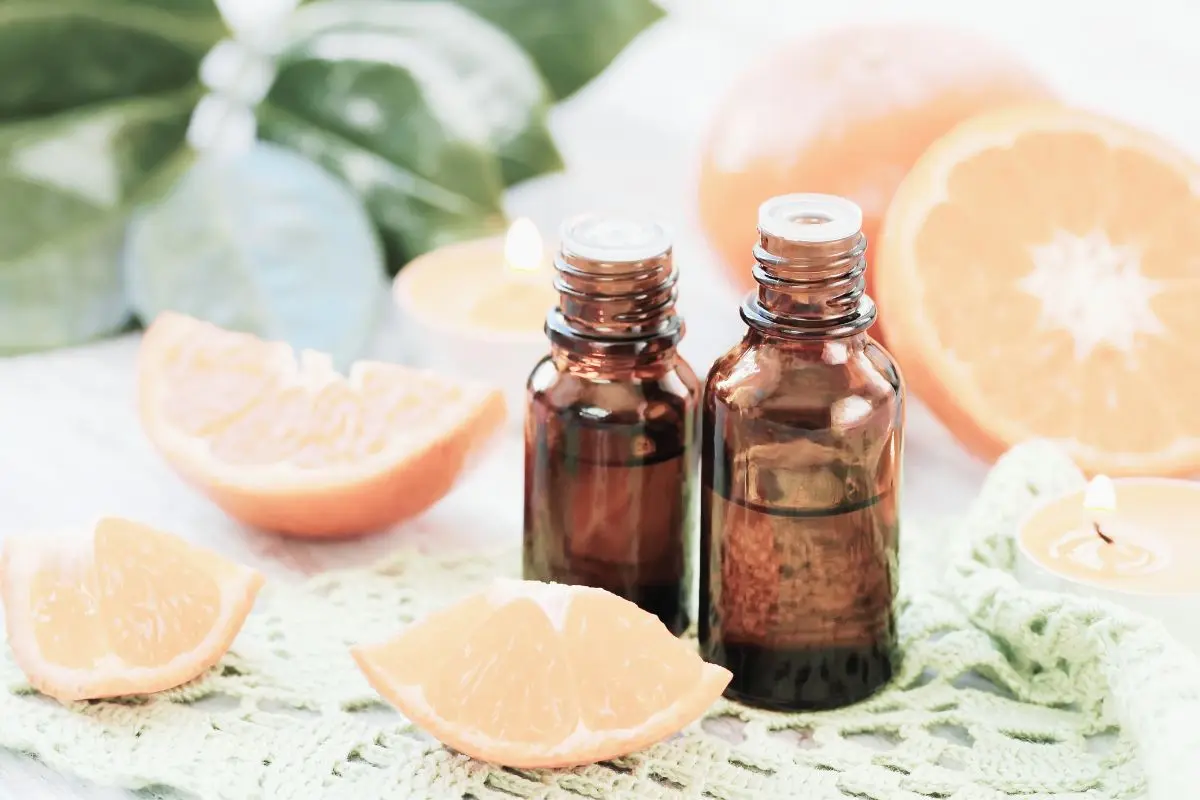 essential oil bottles and grapefruit for cellulite