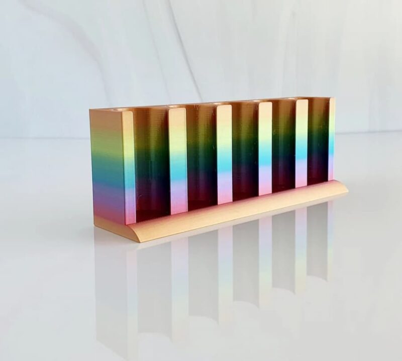 essential oil roller stand in rainbow