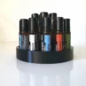 3d printed round roller stand in black with doTERRA rollers