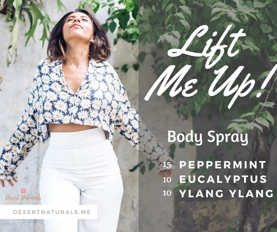 happy woman with recipe for lift me up body spray using essential oils