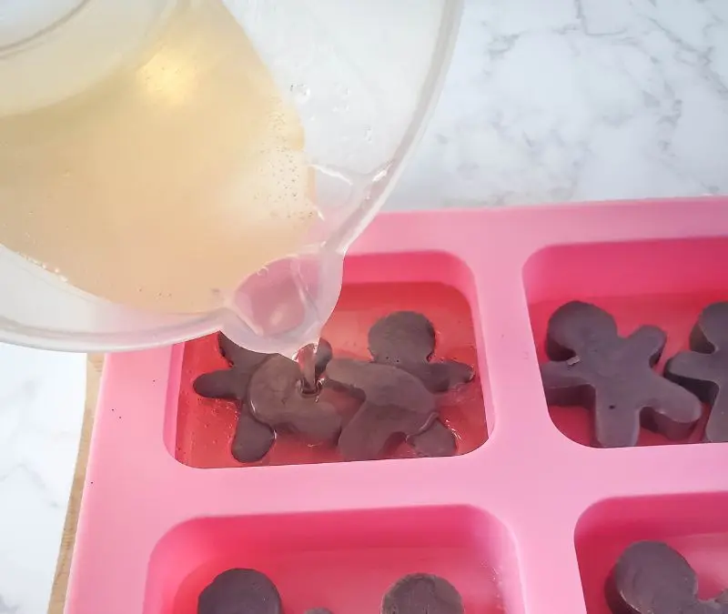 image of pouring melted soap into mold