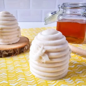 photo of homemade honey bee shea butter soap in the shape of a beehive