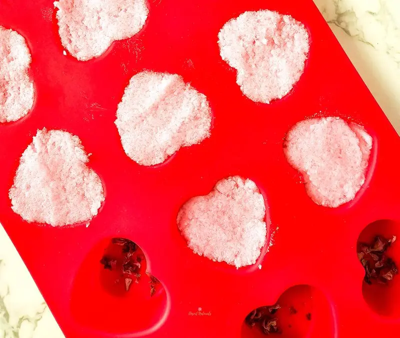 diy romance shower steamers mixture drying in heart shaped silicone mold