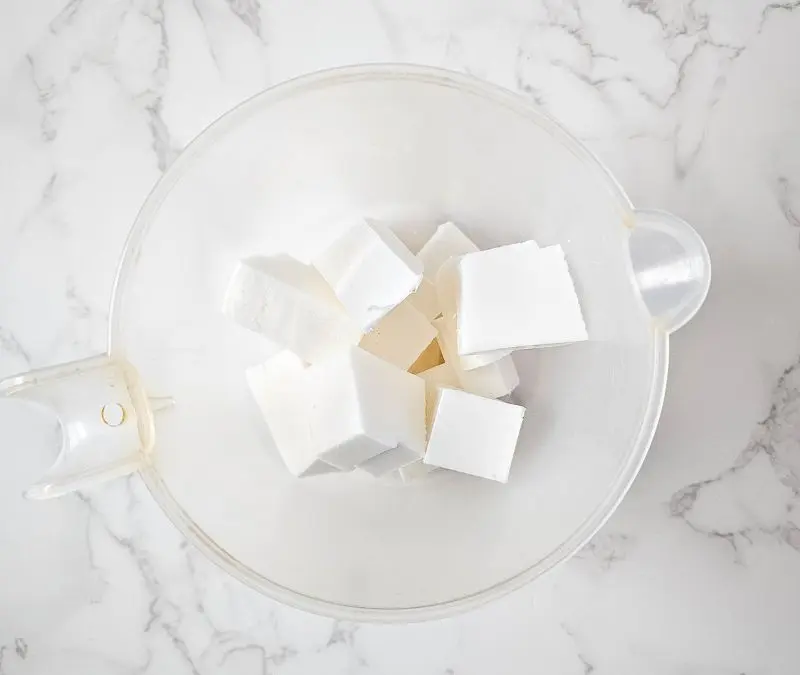 natural melt and pour soap base cut into squares in a microwave safe container