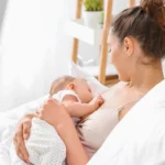 photo of breastfeeding mom and baby