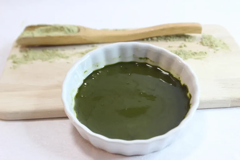 bowl of homemade green tea face mask