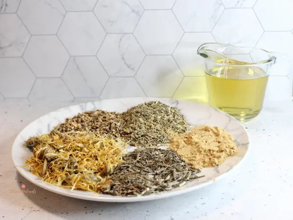 photo of herbs and oils ingredients needed to make lymph drainage cream