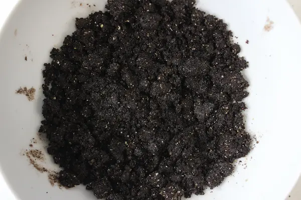 close up of coffee oatmeal scrub in a bowl