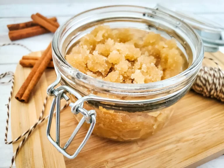 a jar of homemade apple cinnamon sugar scrub for fall