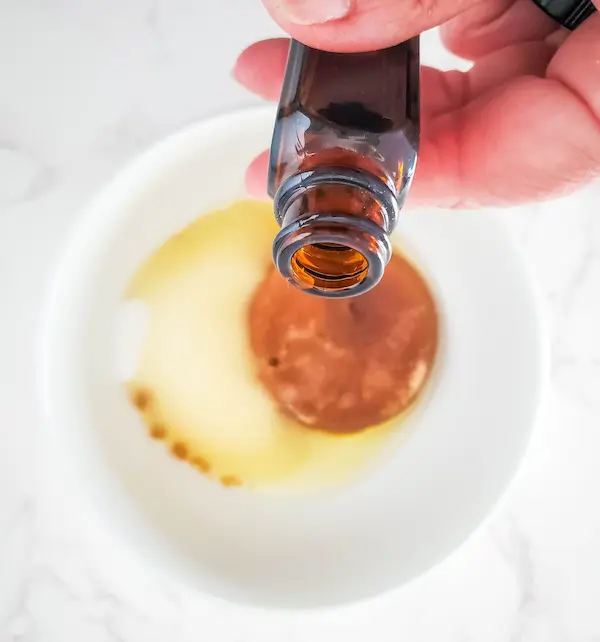 making fall sugar scrub - adding essential oil