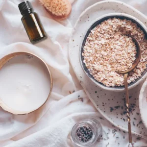 photo of bowl, oats, essential oil and lavender for a milk bath