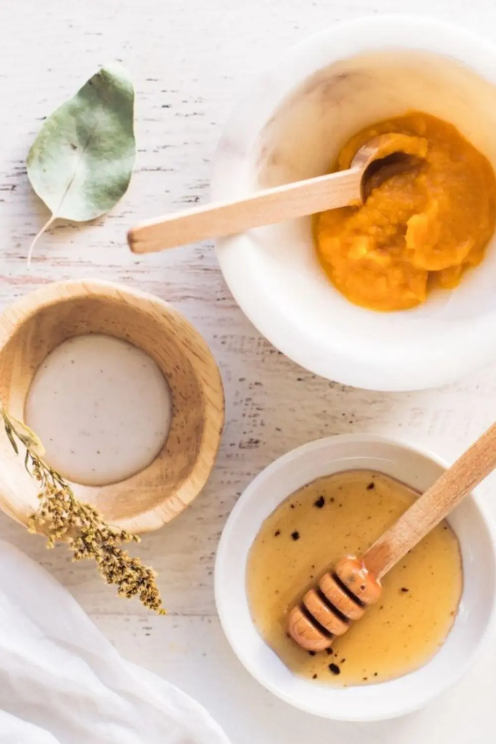bowls of ingredients to make a homemade hydrating pumpkin glow face mask