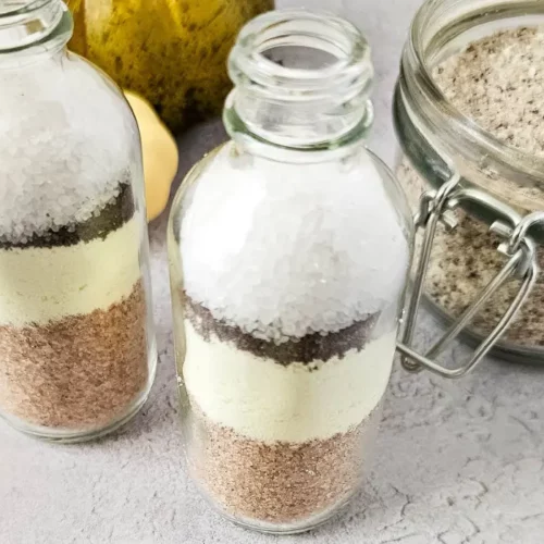 image of layered pumpkin spice latte bath salts in a glass bottle