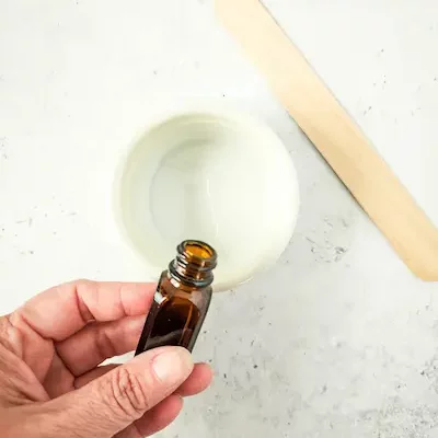 Pumpkin Latte Bath Salts DIY Recipe 14 adding essential oils to almond oil for making pumpkin latte bath salts