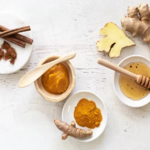 bowls of pumpkin, cinnamon, honey and turmeric for a diy pumpkin spice facemask