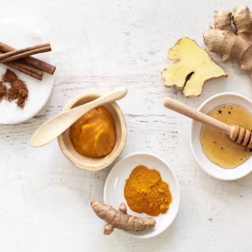 bowls of pumpkin, cinnamon, honey and turmeric for a diy pumpkin spice facemask