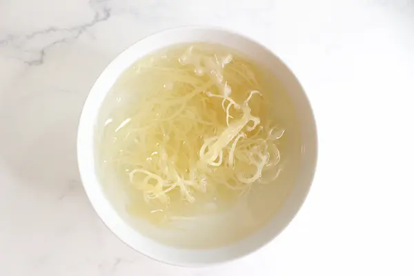 bowl of sea moss and water for making sea moss soap