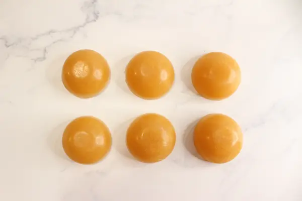 6 sea moss soaps on the 
 counter