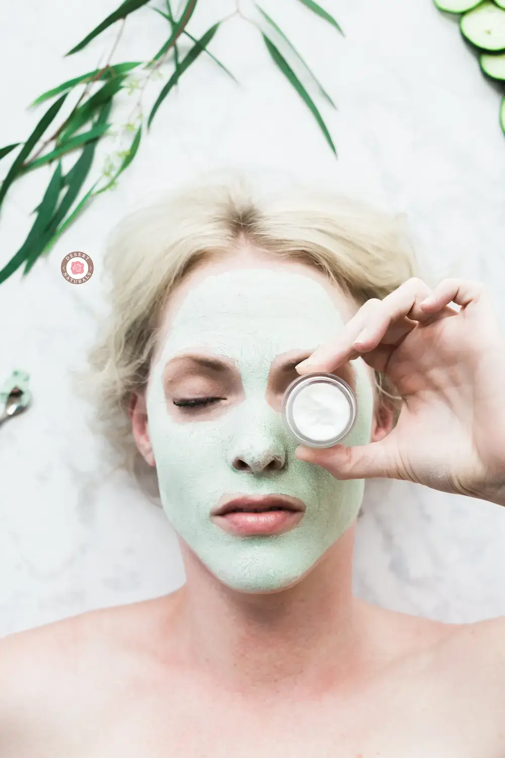 woman with a homemade aloe and green tea face mask