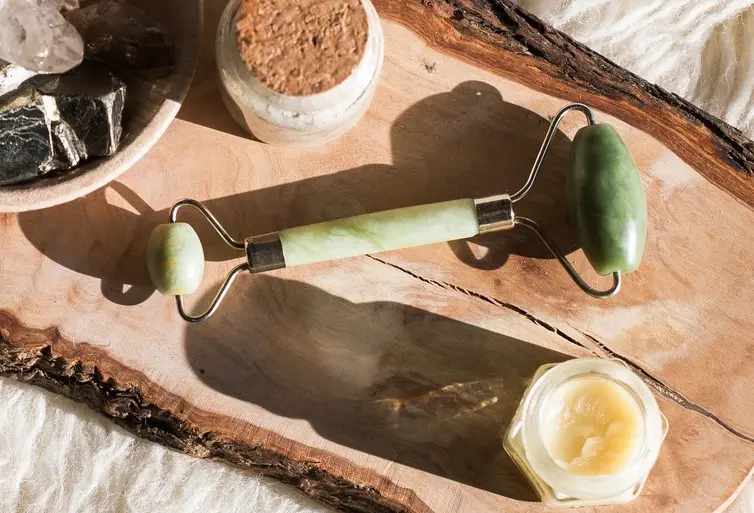 8 Homemade Face Mask DIY Recipes with natural ingredients for your skin care routine 17 jade roller with jars of homemade skin creams