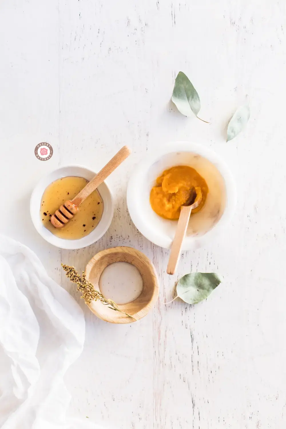 bowls of ingredients for a pumpkin face mask