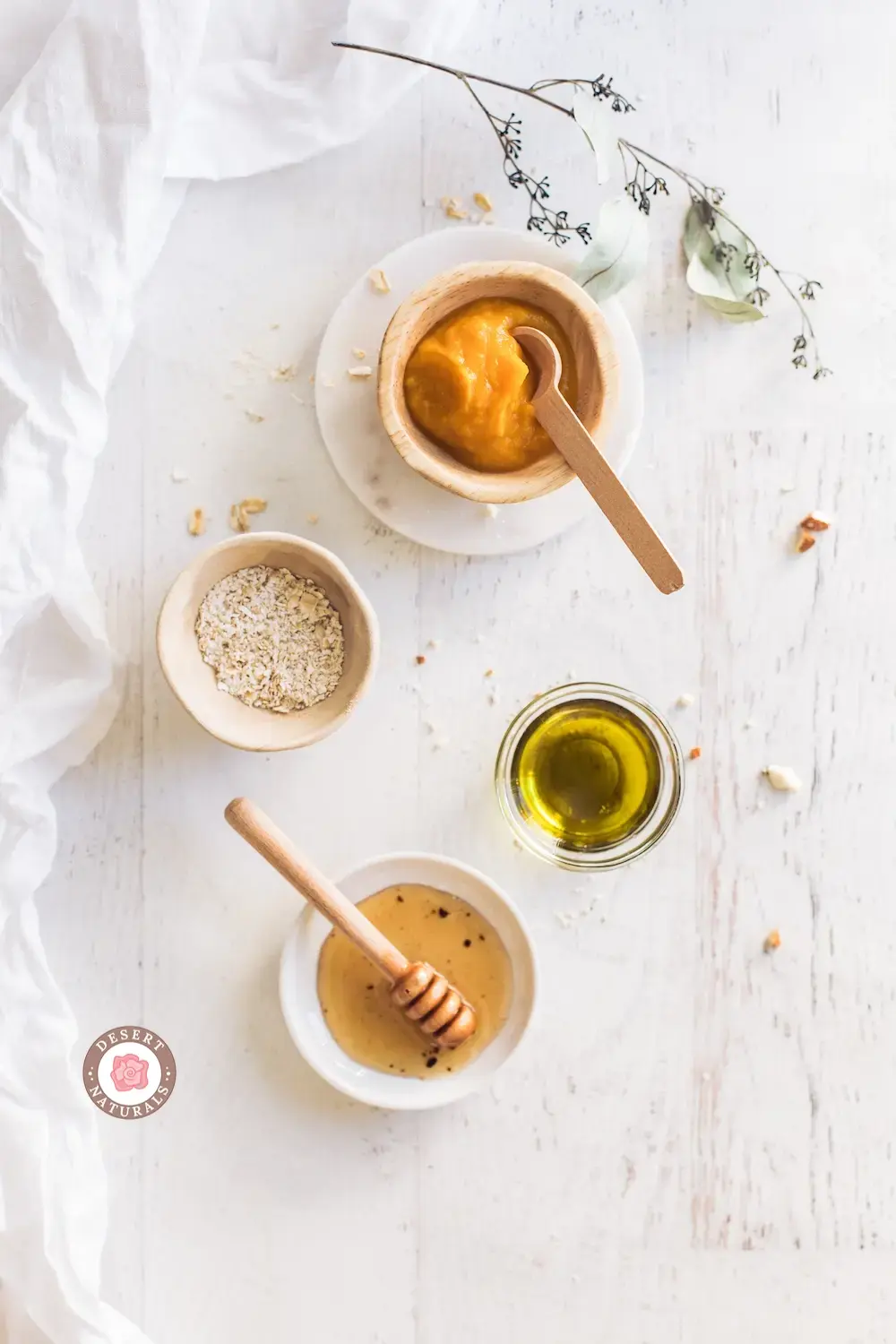 bowls of ingredients for a homemade pumpkin oats face mask