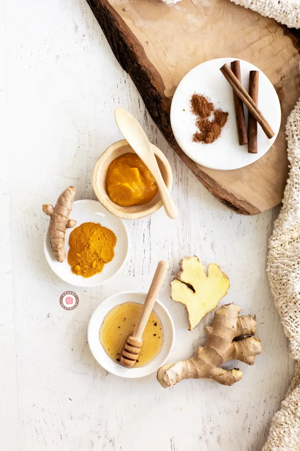 bowls of ingredients for a homemade pumpkin spice turmeric honey face mask