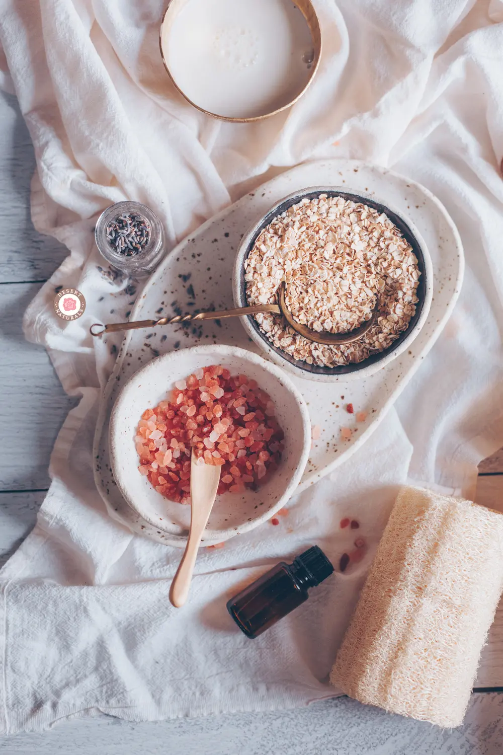 bowls of salts, milk and oats, milk and lavender essential oil to make a milk bath