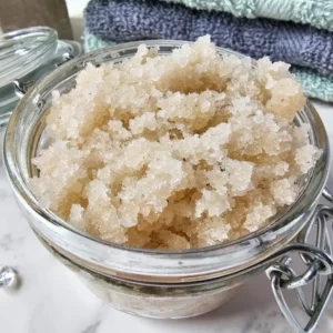 a jar of homemade vanilla orange sugar scrub