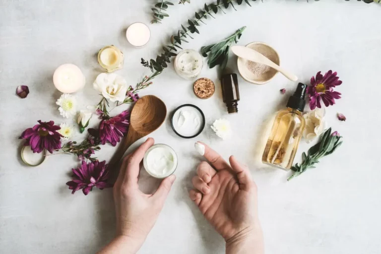 jars of creams and bottles of oils for making natural skincare recipes