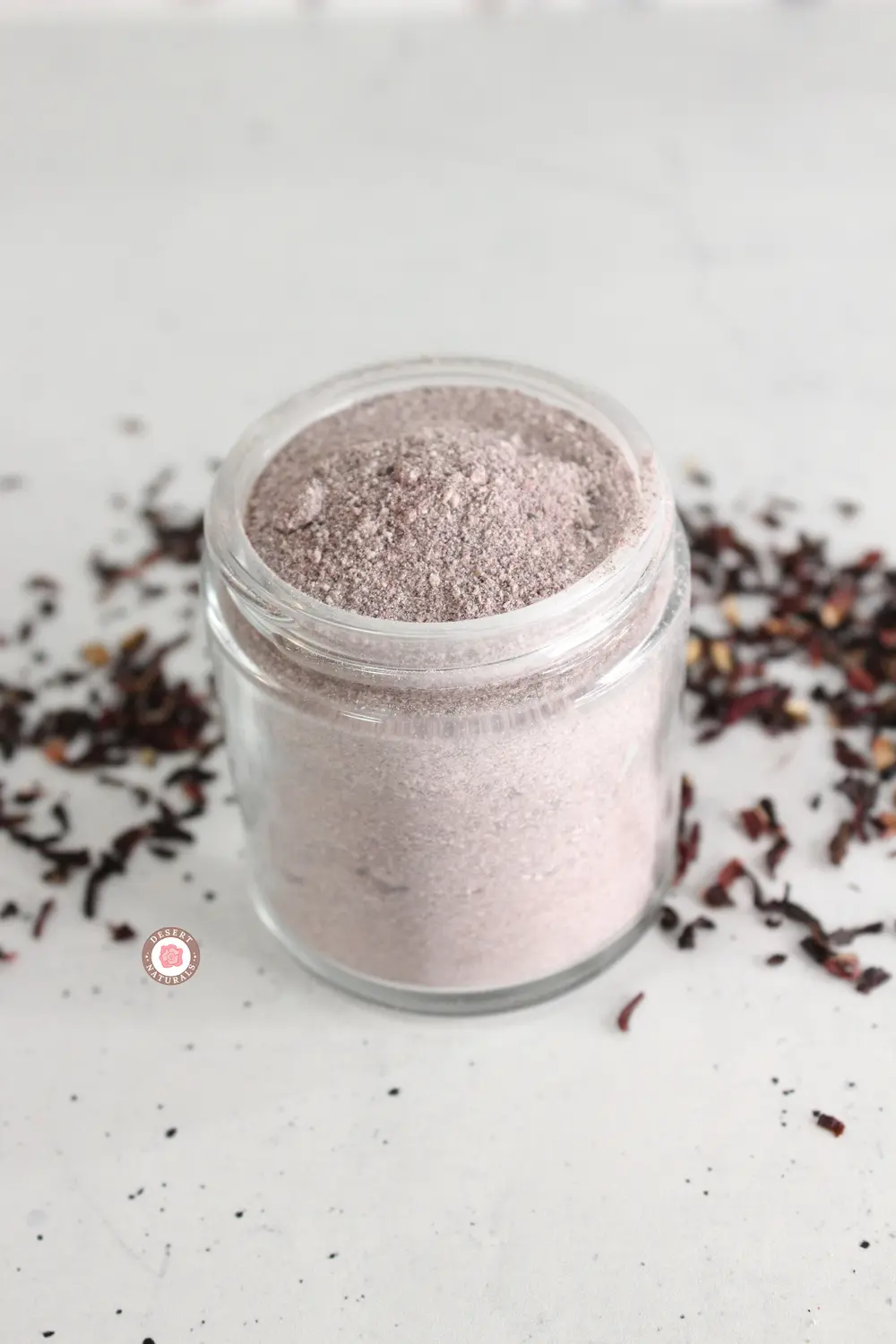jar of homemade hibiscus face and body scrub