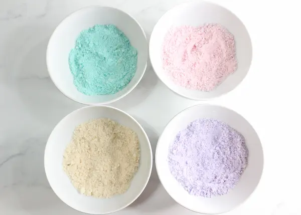 4 bowls with a different colored epsom salt in each