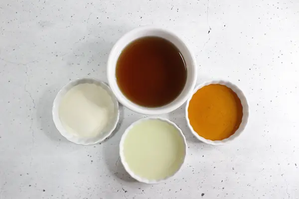 bowls of ingredients needed to make homemade sleep gummies