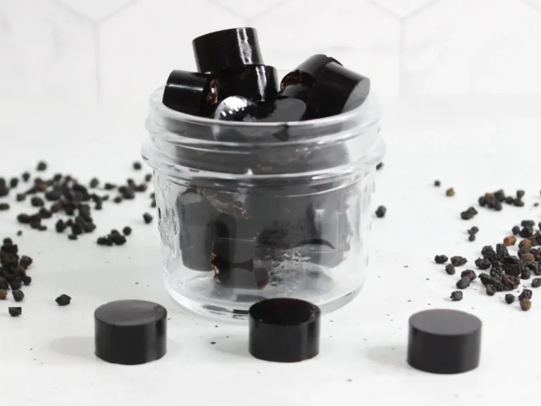 clear glass jar of homemade elderberry gummies