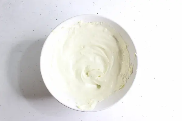 a bowl of whipped diaper rash cream
