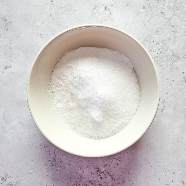 bowl of epsom salts for making gingerbread shower bombs