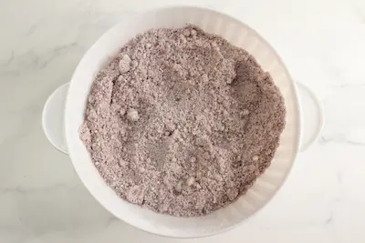 a bowl of hibiscus bath bomb mixture