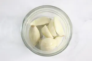jar of garlic for making infused honey