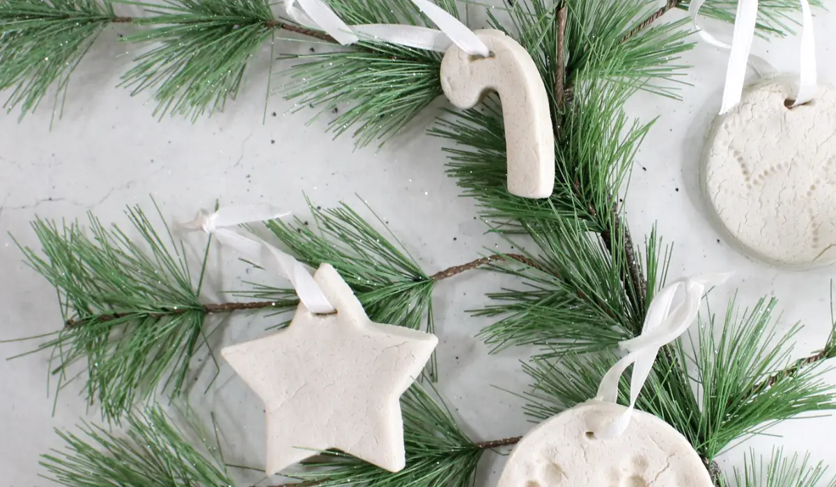 homemade no bake diffuser ornaments on Christmas tree greenery