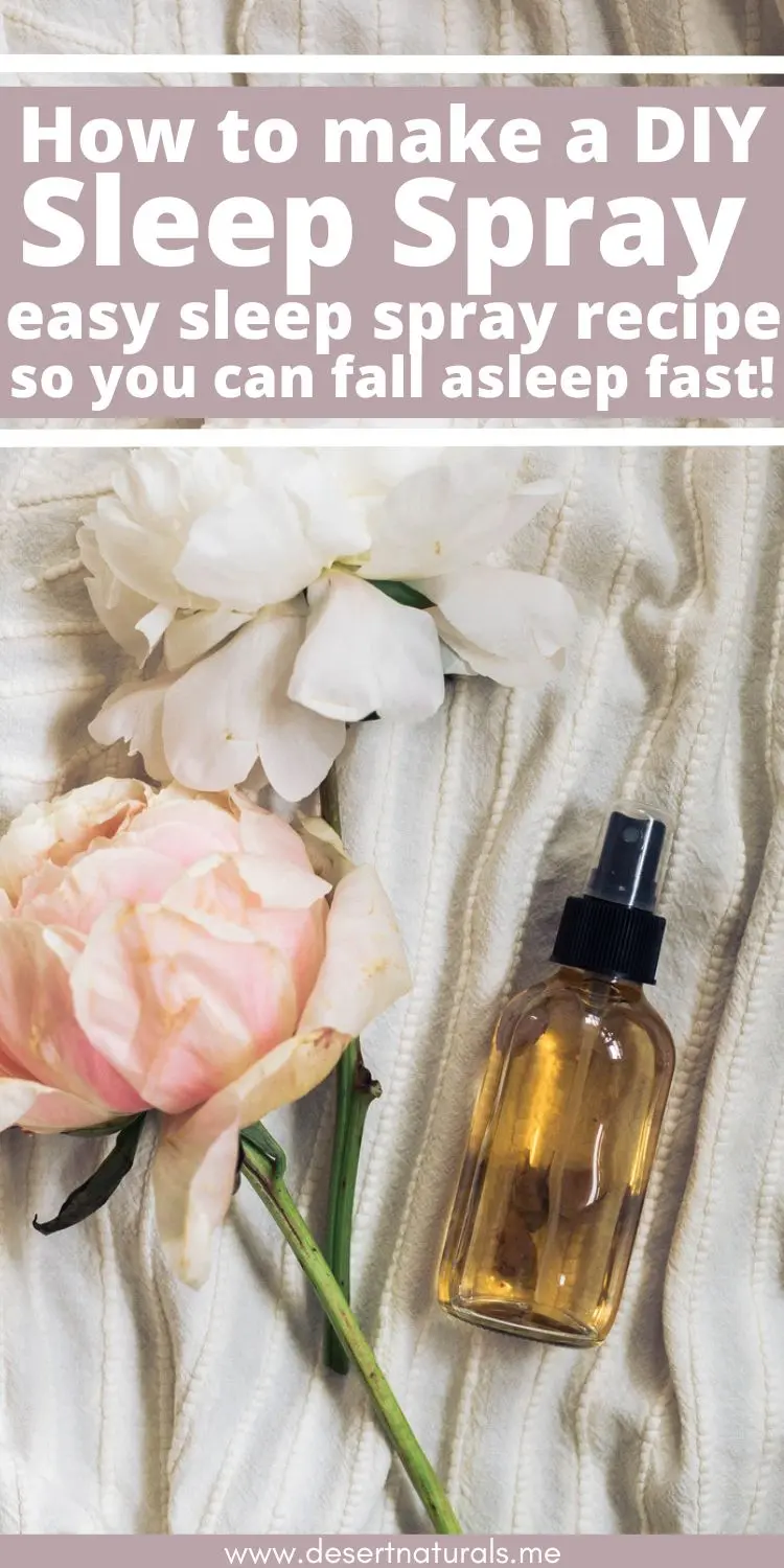 homemade diy linen sleep spray bottle on white linen and roses