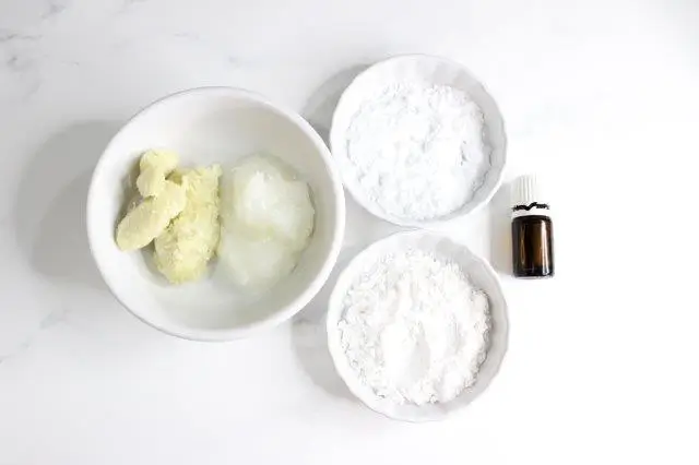 bowls of ingredients and supplies needed to make homemade diy cream deodorant