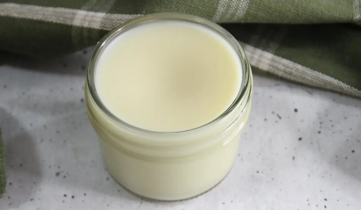 glass jar of homemade beard balm from a natural diy recipe