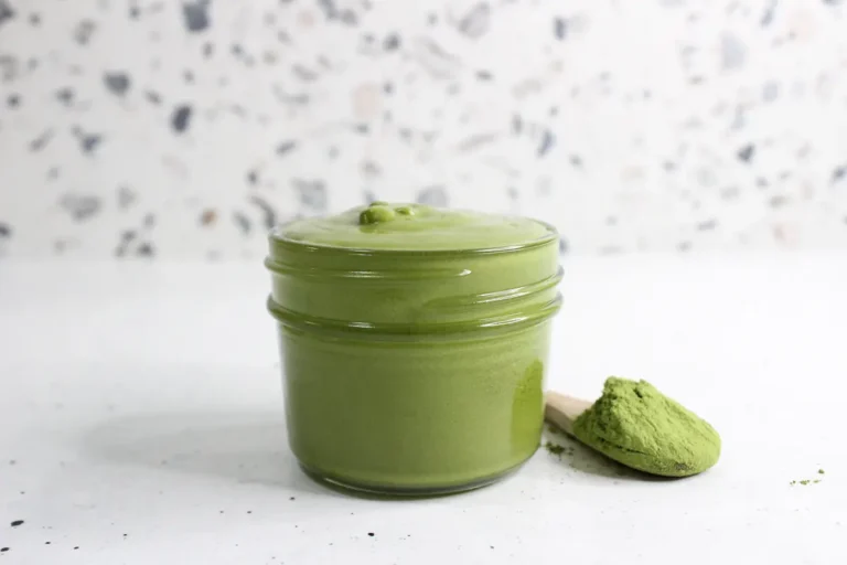 clear glass jar of homemade green tea face cream