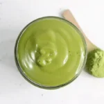 top view of a jar of homemade green tea face cream