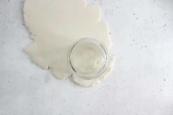 no bake diffuser ornament dough with a jar being used as a cookie cutter