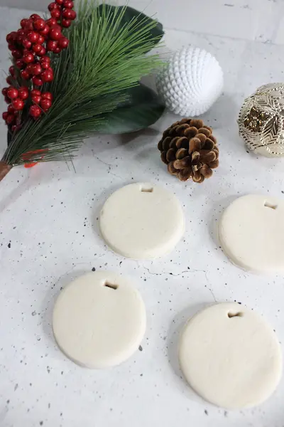 cut out no bake diffuser ornaments with Christmas greenery and decorations
