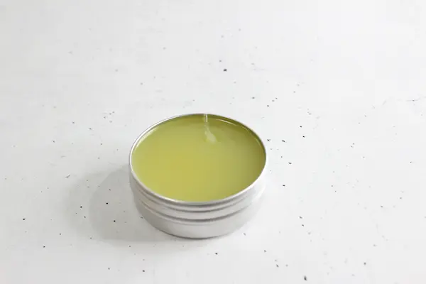 tin of homemade sleep salve 