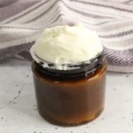 jar of homemade tallow body butter lotion