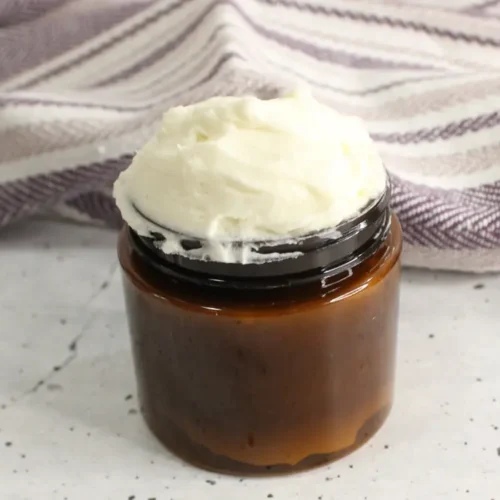 jar of homemade tallow body butter lotion