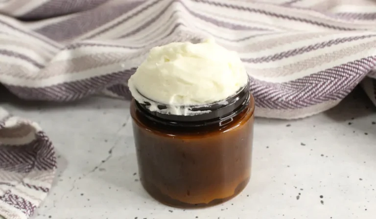 jar of homemade tallow body butter lotion